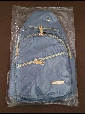 Quilted Light Blue Women's Sling Bag with Gold Accents